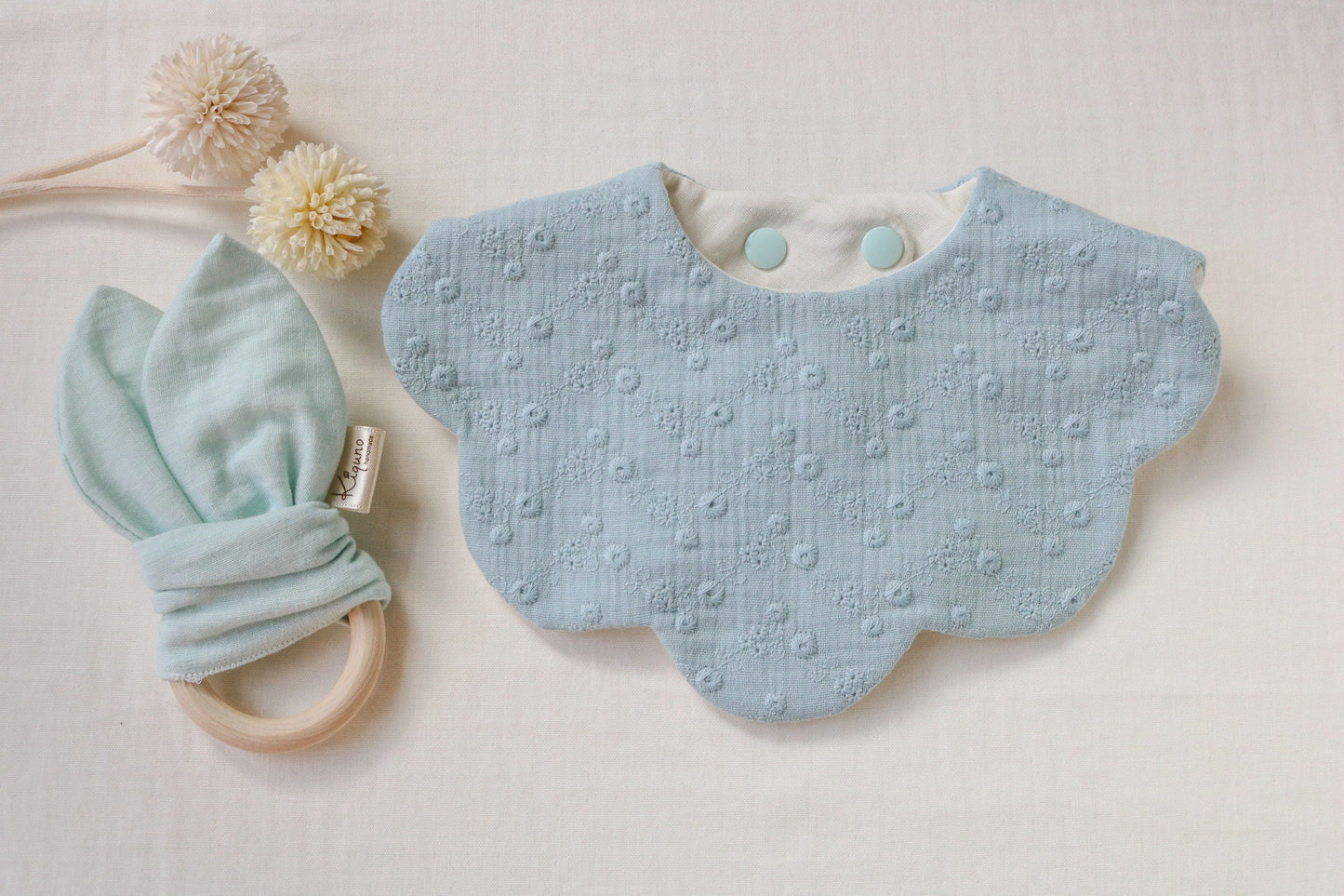 Blue flower embroidery bib