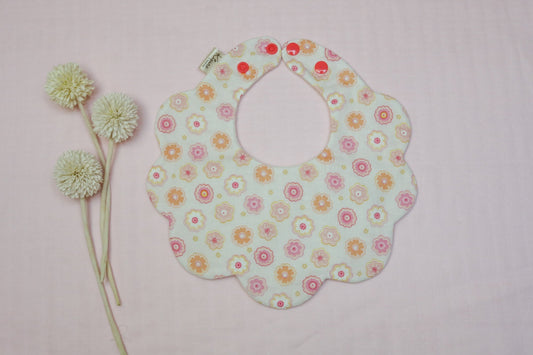 Small flower garden scalloped bib